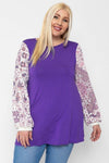 Floral Print, Contrasting Bubble Sleeves Tunic With A Round Neckline.